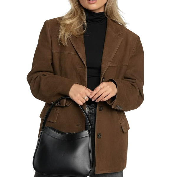 Rich brown suede meets effortless elegance — a statement piece that turns every cold day into a l...